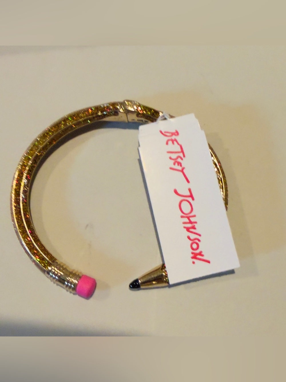 Betsey Johnson Bronze Gold Toned Pencil hinged Bracelet. Fun and Flashy